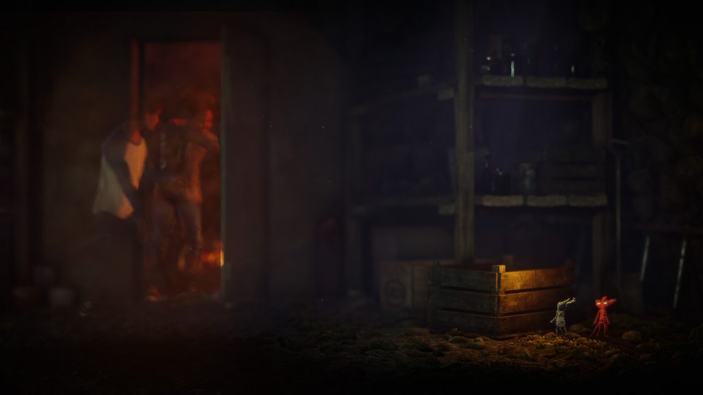 A dim interior with candles and yarn characters in Unravel Two.