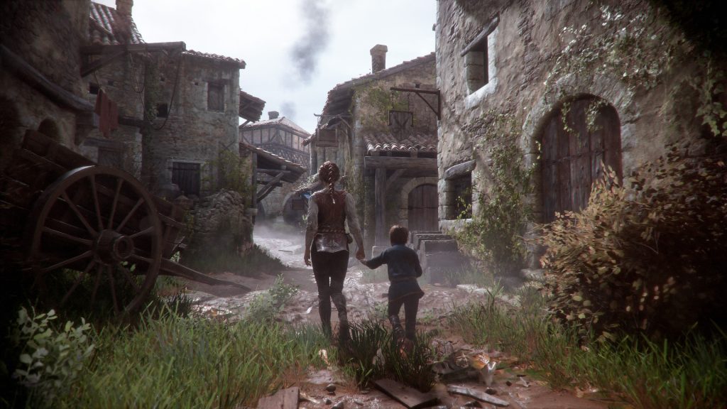 Two siblings walking through a stone-built village in A Plague Tale: Innocence.