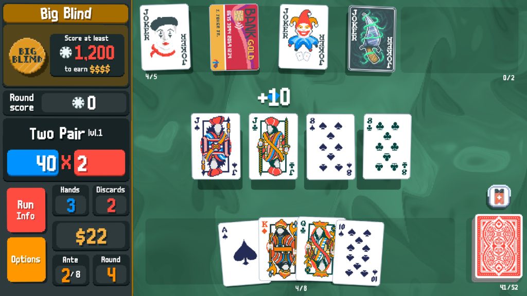 Playing cards and Joker cards arranged on the scoring table in Balatro.