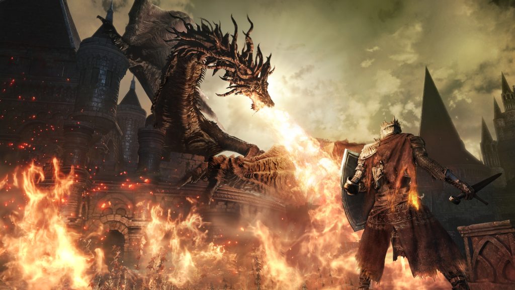 An armoured character facing a fire-breathing dragon in Dark Souls III.