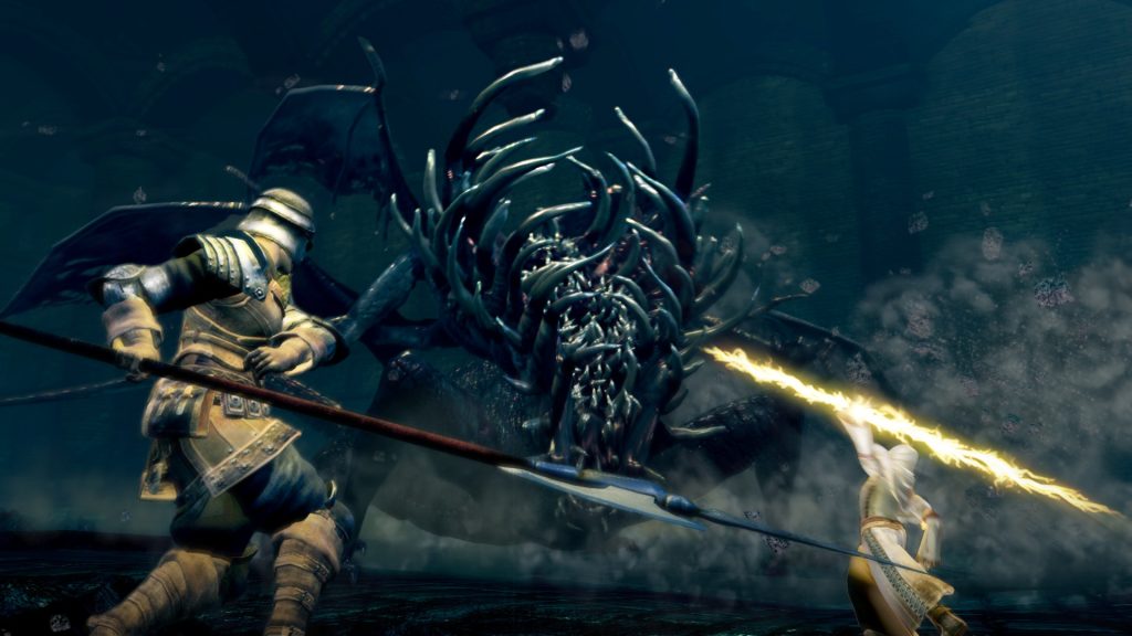 An armoured warrior confronting a many-limbed creature in Dark Souls: Remastered.