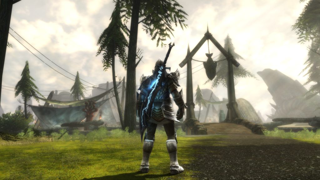 An armed adventurer approaching a camp in Kingdoms of Amalur: Re-Reckoning.