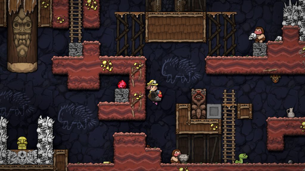 Explorers moving through a cave with ladders and traps in Spelunky 2.