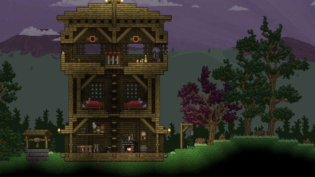 A multi-storey wooden house in a pixel-art landscape in Starbound.